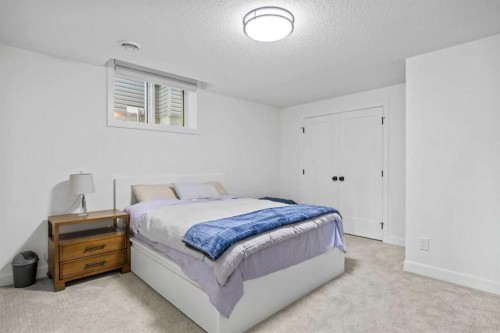656 Bayview Way Sw, Airdrie, AB - Indoor Photo Showing Bedroom