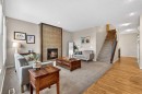 401 Mahogany Court Se, Calgary, AB  - Indoor Photo Showing Living Room With Fireplace 