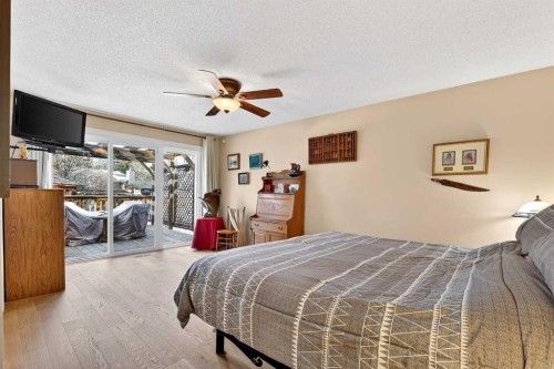80 Oakmount Way Sw, Calgary, AB - Indoor Photo Showing Bedroom