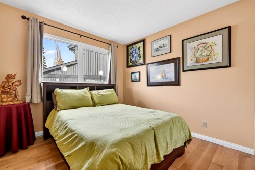 80 Oakmount Way Sw, Calgary, AB - Indoor Photo Showing Bedroom
