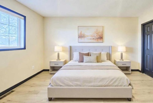 131 Arbour Wood Close Nw, Calgary, AB - Indoor Photo Showing Bedroom