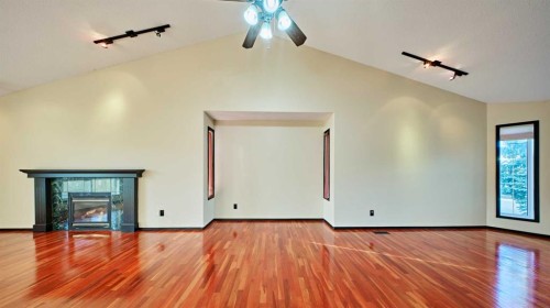 131 Arbour Wood Close Nw, Calgary, AB - Indoor Photo Showing Other Room With Fireplace