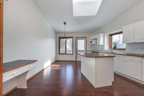 137 Arbour Ridge Heights Nw, Calgary, AB - Indoor Photo Showing Kitchen With Double Sink