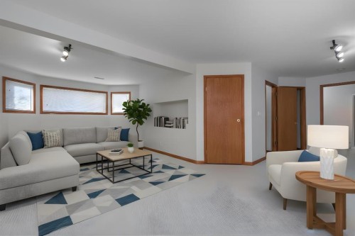 137 Arbour Ridge Heights Nw, Calgary, AB - Indoor Photo Showing Living Room