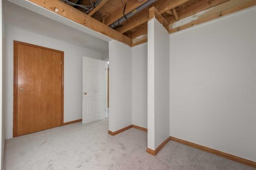137 Arbour Ridge Heights Nw, Calgary, AB - Indoor Photo Showing Other Room