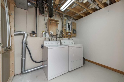 137 Arbour Ridge Heights Nw, Calgary, AB - Indoor Photo Showing Laundry Room