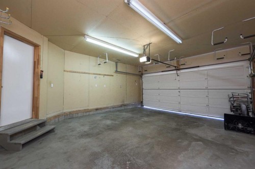 137 Arbour Ridge Heights Nw, Calgary, AB - Indoor Photo Showing Garage