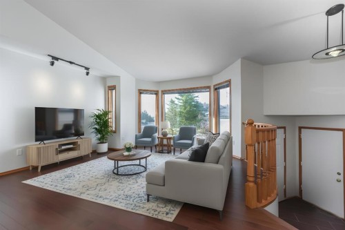 137 Arbour Ridge Heights Nw, Calgary, AB - Indoor Photo Showing Living Room