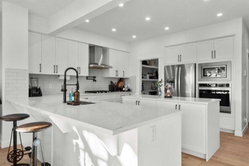 116 Ranchers View, Okotoks, AB - Indoor Photo Showing Kitchen With Upgraded Kitchen