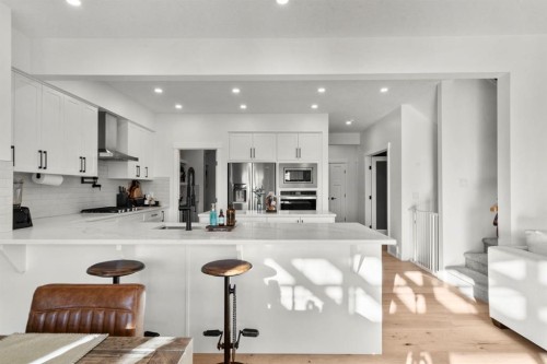 116 Ranchers View, Okotoks, AB - Indoor Photo Showing Kitchen With Upgraded Kitchen