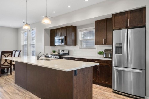 2001-280 Williamstown Close Nw, Airdrie, AB - Indoor Photo Showing Kitchen With Stainless Steel Kitchen With Upgraded Kitchen