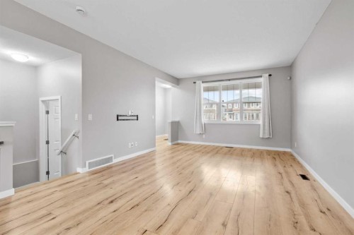 368 Redstone Drive Ne, Calgary, AB - Indoor Photo Showing Other Room With Fireplace