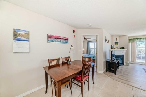 111-6900 Hunterview Drive Nw, Calgary, AB - Indoor Photo Showing Dining Room