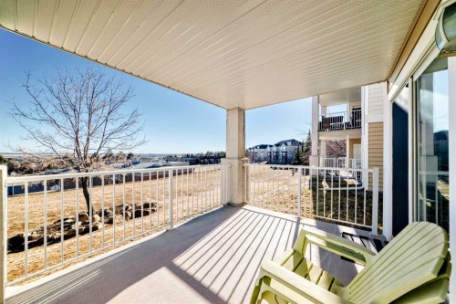 111-6900 Hunterview Drive Nw, Calgary, AB - Outdoor With Deck Patio Veranda With Exterior