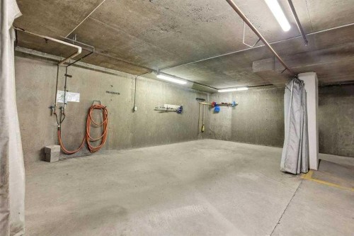111-6900 Hunterview Drive Nw, Calgary, AB - Indoor Photo Showing Garage