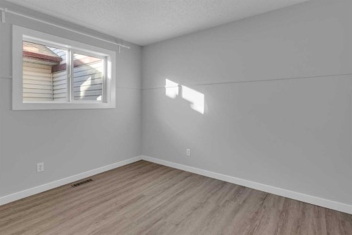 103 Canoe Square Sw, Airdrie, AB - Indoor Photo Showing Other Room