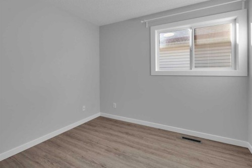 103 Canoe Square Sw, Airdrie, AB - Indoor Photo Showing Other Room