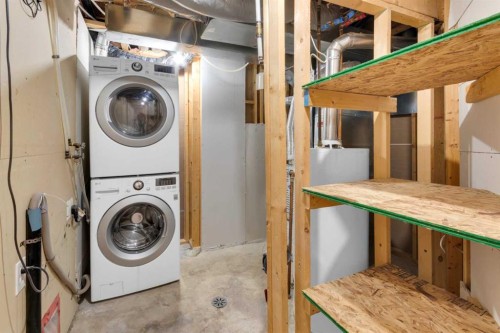 103 Canoe Square Sw, Airdrie, AB - Indoor Photo Showing Laundry Room