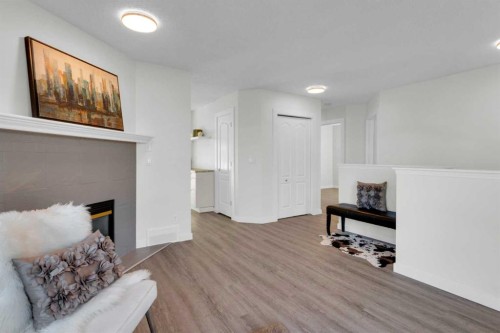 103 Canoe Square Sw, Airdrie, AB - Indoor With Fireplace