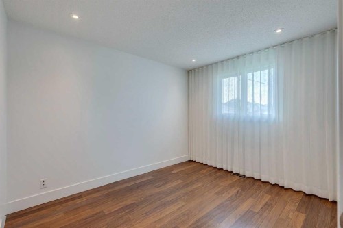 23 Erin Grove Court Se, Calgary, AB - Indoor Photo Showing Other Room