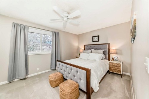 21 Woodfern Road Sw, Calgary, AB - Indoor Photo Showing Bedroom