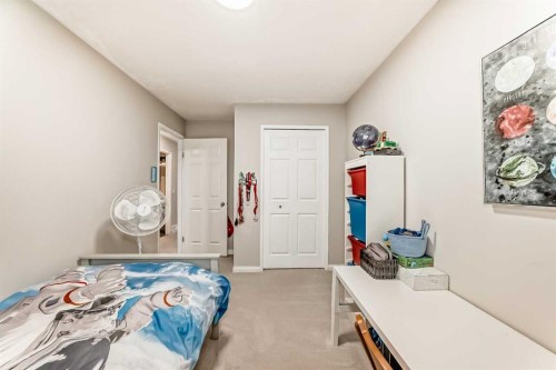 21 Woodfern Road Sw, Calgary, AB - Indoor Photo Showing Bedroom