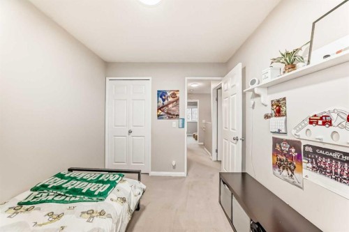 21 Woodfern Road Sw, Calgary, AB - Indoor Photo Showing Bedroom