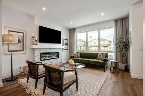 199 Annette Landing, Calgary, AB - Indoor Photo Showing Living Room With Fireplace
