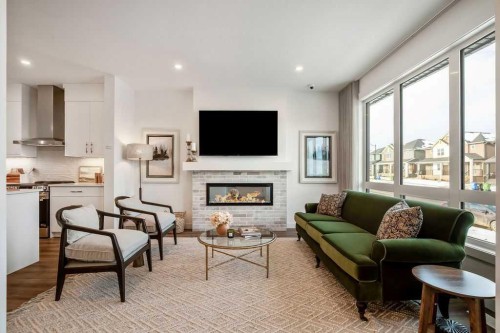 199 Annette Landing, Calgary, AB - Indoor Photo Showing Living Room With Fireplace
