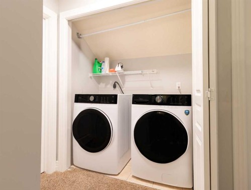175-77 Glamis Green Sw, Calgary, AB - Indoor Photo Showing Laundry Room