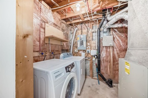131 Taradale Drive Ne, Calgary, AB - Indoor Photo Showing Laundry Room