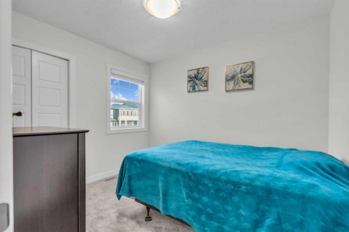 35 Versant View Sw, Calgary, AB - Indoor Photo Showing Bedroom