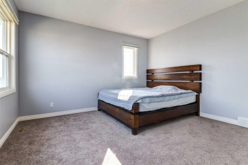 14 Marquis Heights Se, Calgary, AB - Indoor Photo Showing Bedroom