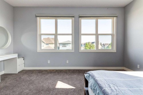 14 Marquis Heights Se, Calgary, AB - Indoor Photo Showing Bedroom