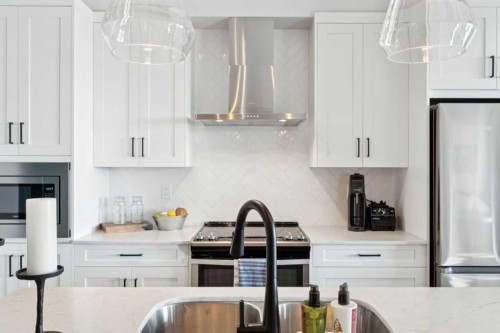 417-400 Auburn Meadows Common Se, Calgary, AB - Indoor Photo Showing Kitchen With Stainless Steel Kitchen With Double Sink With Upgraded Kitchen