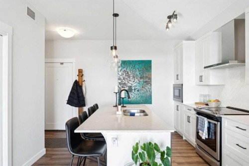 417-400 Auburn Meadows Common Se, Calgary, AB - Indoor Photo Showing Kitchen With Double Sink With Upgraded Kitchen