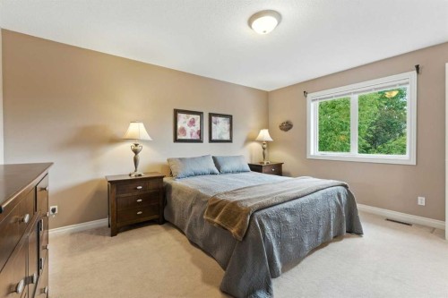 37 Thomas Street Nw, Langdon, AB - Indoor Photo Showing Bedroom