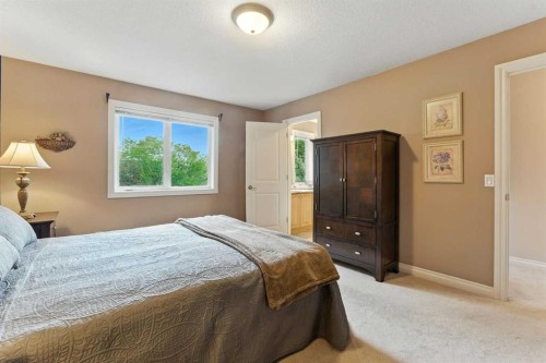 37 Thomas Street Nw, Langdon, AB - Indoor Photo Showing Bedroom