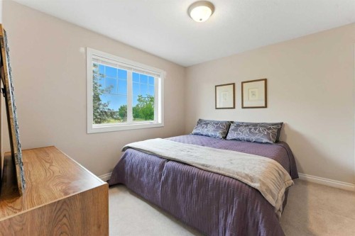 37 Thomas Street Nw, Langdon, AB - Indoor Photo Showing Bedroom