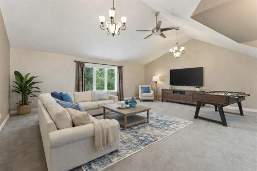 37 Thomas Street Nw, Langdon, AB - Indoor Photo Showing Living Room