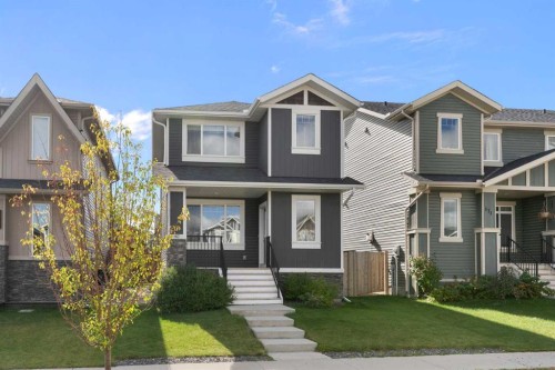 167 Fireside Drive, Cochrane, AB - Outdoor With Facade