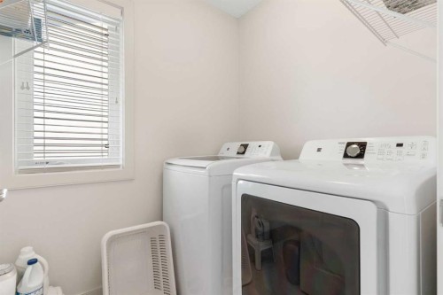 167 Fireside Drive, Cochrane, AB - Indoor Photo Showing Laundry Room