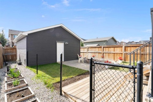 167 Fireside Drive, Cochrane, AB - Outdoor With Deck Patio Veranda With Exterior