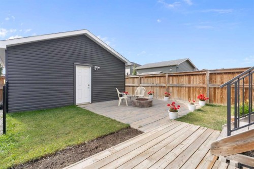 167 Fireside Drive, Cochrane, AB - Outdoor With Deck Patio Veranda With Exterior