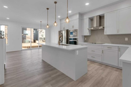 200 Starling Place Nw, Calgary, AB - Indoor Photo Showing Kitchen With Upgraded Kitchen