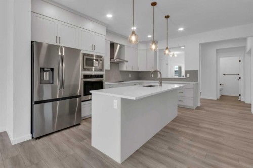 200 Starling Place Nw, Calgary, AB - Indoor Photo Showing Kitchen With Upgraded Kitchen