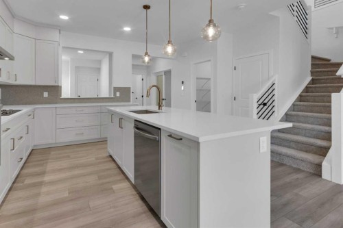 200 Starling Place Nw, Calgary, AB - Indoor Photo Showing Kitchen With Upgraded Kitchen