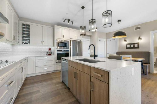 108-100 Auburn Meadows Common Se, Calgary, AB - Indoor Photo Showing Kitchen With Upgraded Kitchen