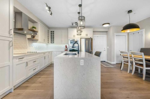 108-100 Auburn Meadows Common Se, Calgary, AB - Indoor Photo Showing Kitchen With Upgraded Kitchen