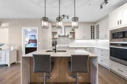 108-100 Auburn Meadows Common Se, Calgary, AB - Indoor Photo Showing Kitchen With Upgraded Kitchen